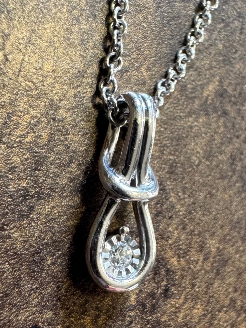 Sterling Silver and Diamond Love Knot Necklace and Earrings Set
